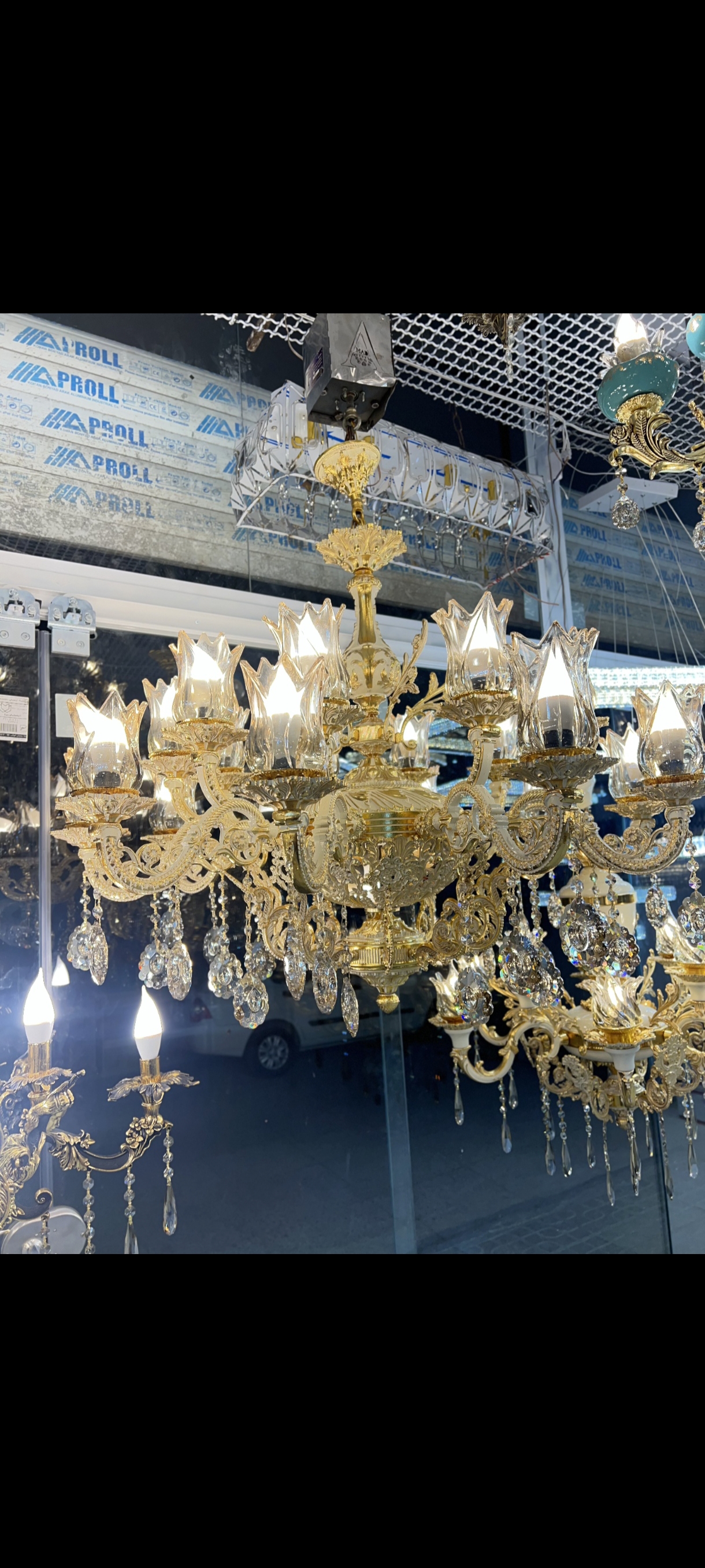 لوستر شاه عباسی پتینه طلایی مدل گلناز 23شعله زیر توری